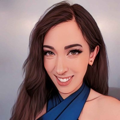 Cartoon image of Ultrasaurus wearing a blue top with her brown hair down and looking towards the camera